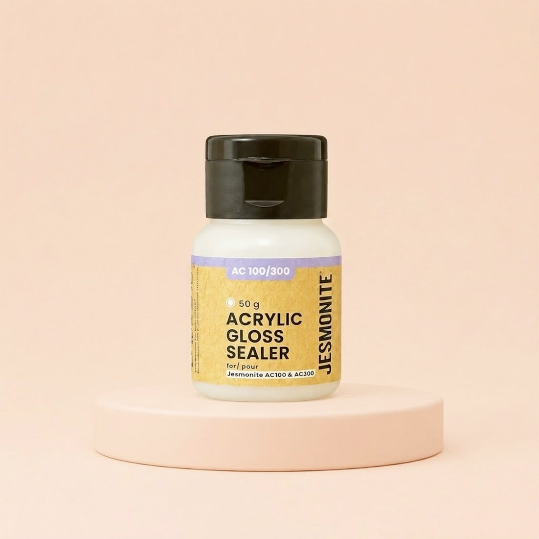 Petit flacon de vernis acrylique brillant Jesmonite sur socle beige