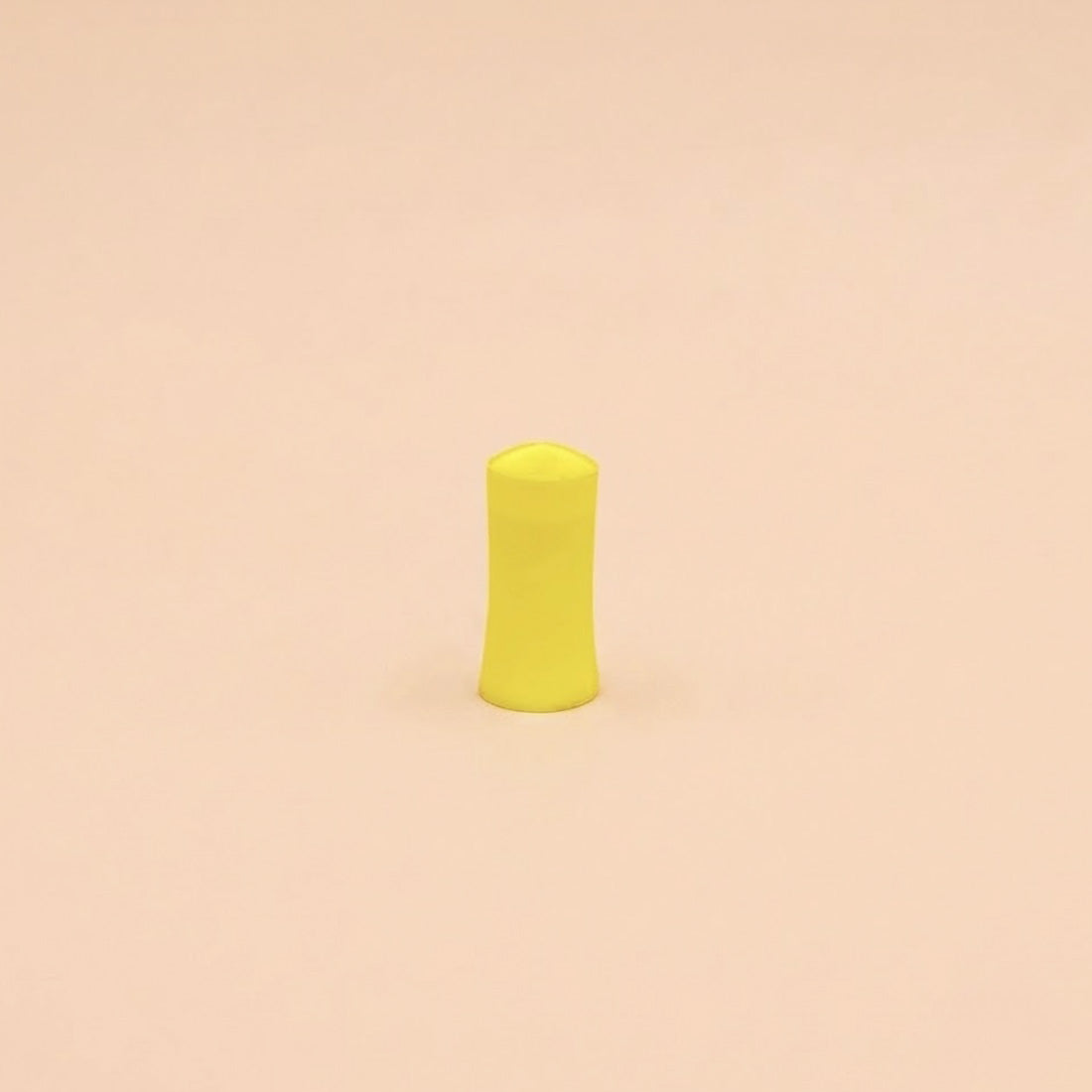 Bloc de ponçage jaune de 25 mm de diamètre, posé debout