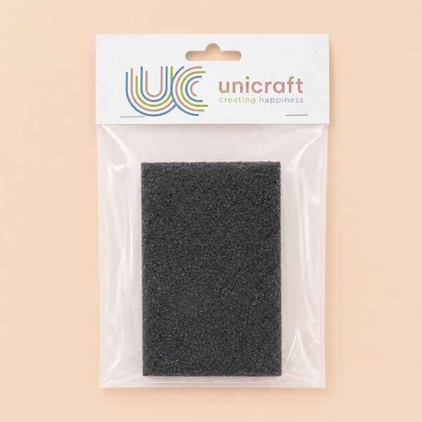 Éponge abrasive à grains moyens dans son emballage Unicraft