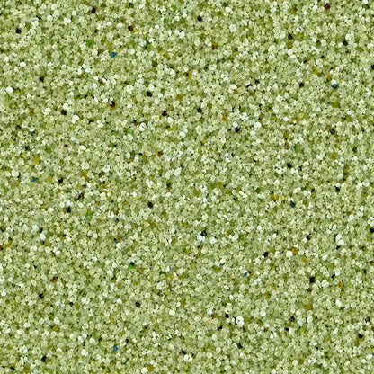 Gros plan sur les granulats de verre recyclé GlassRoxx teinte vert clair