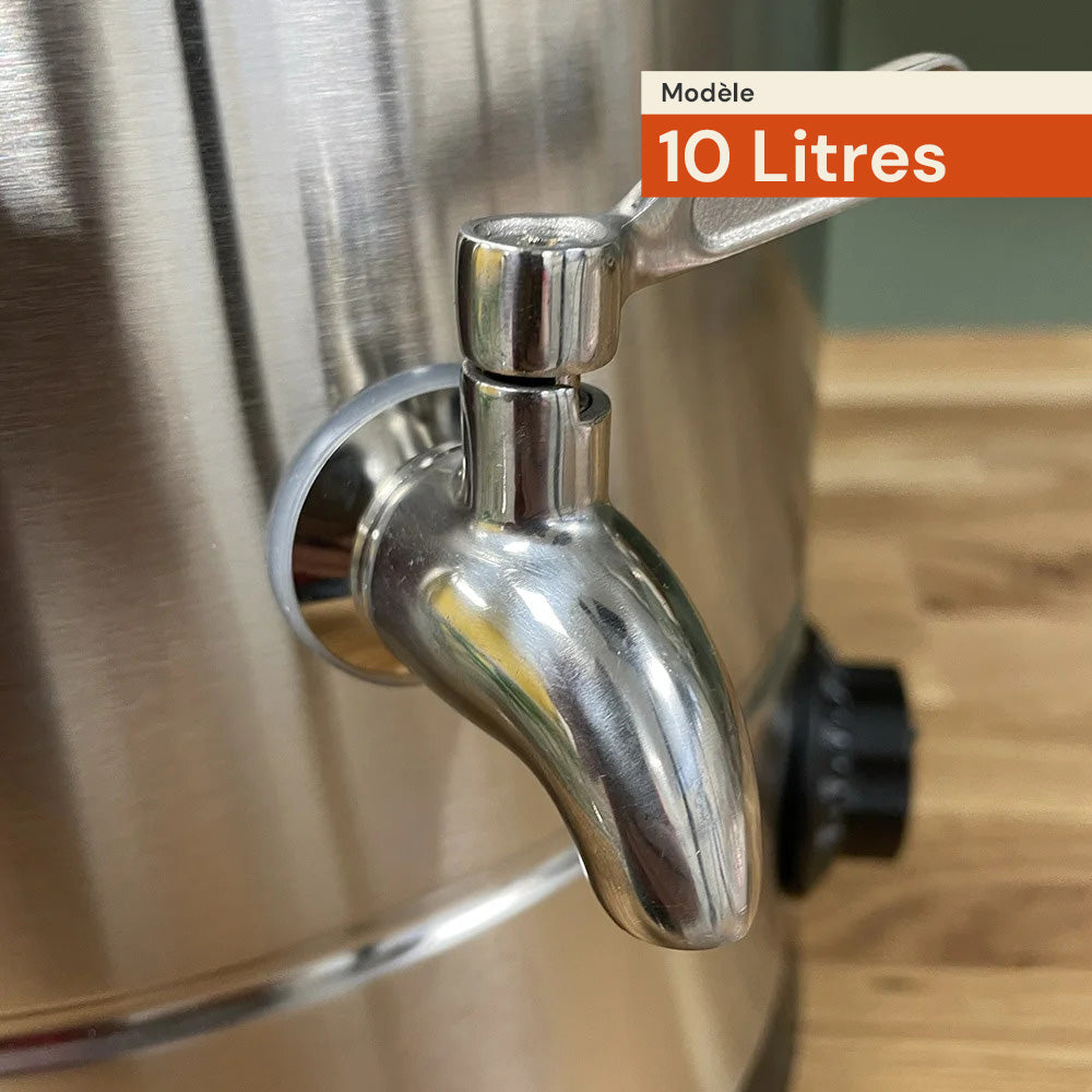 Gros plan sur le robinet de la machine de fonte 10 litres