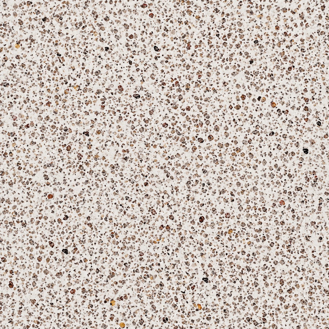 Gros plan sur les granulats de granit naturel StoneRoxx rose beige moucheté