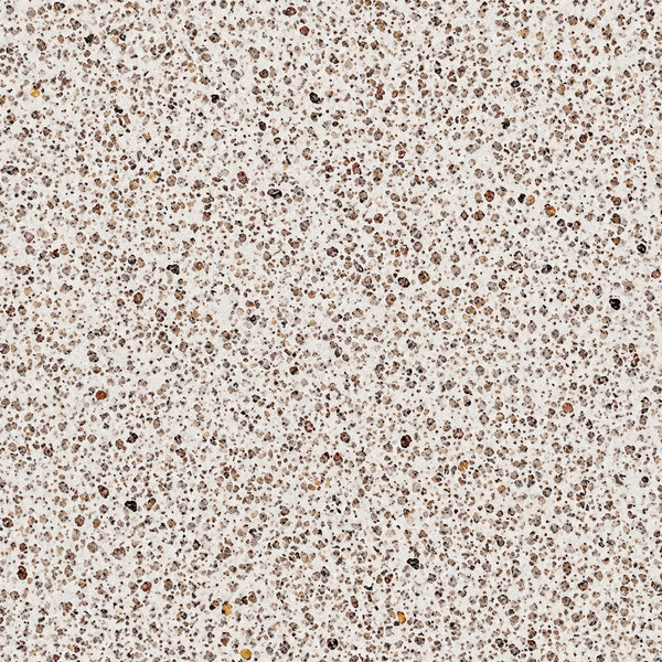 Gros plan sur les granulats de granit naturel StoneRoxx rose beige moucheté